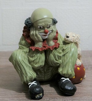 35777   Trauriger mit Hund, grün   1998