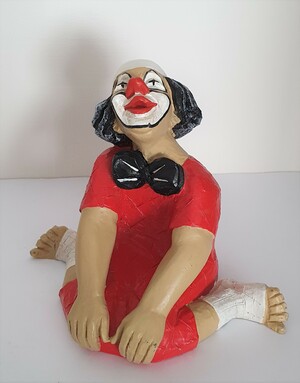 14117.A   Clown, sitzend, gegrätschte Haltung, verträumt   1987