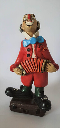 14111   Akkordeon-Clown auf Koffer   1986 